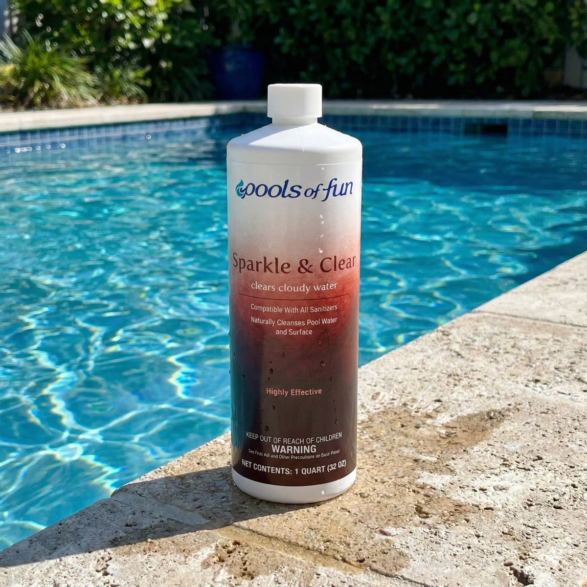 Bottle of 'Pools of Fun Sparkle & Clear' by a pool